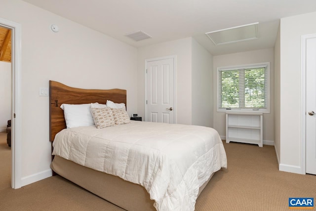 bedroom with light colored carpet