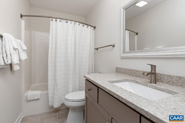 full bathroom featuring tile patterned flooring, shower / bath combo, toilet, and vanity