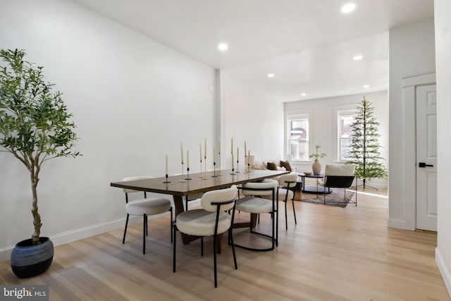 dining room with light wood-type flooring