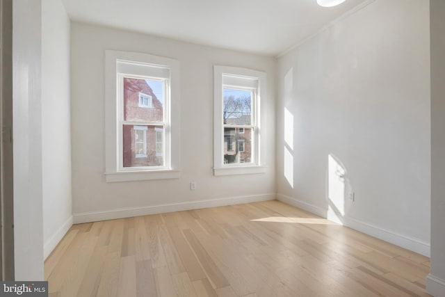 unfurnished room featuring light wood-type flooring