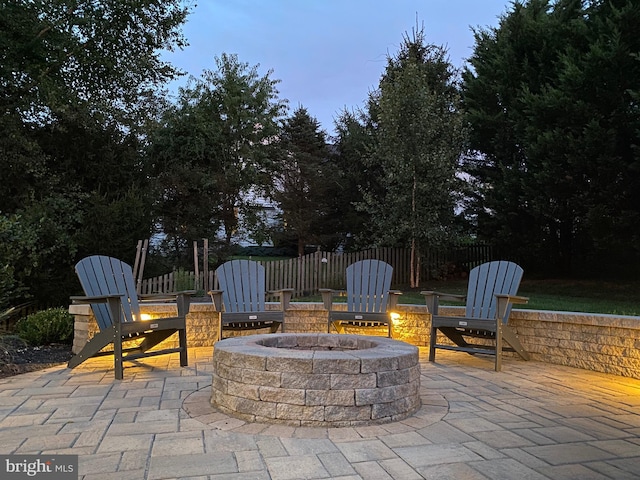 view of patio featuring a fire pit