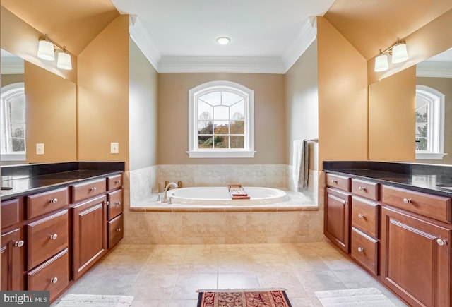 bathroom with tile patterned floors, vanity, ornamental molding, and tiled bath