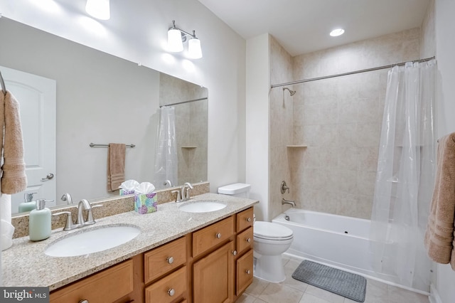 full bathroom featuring toilet, shower / tub combo, vanity, and tile patterned floors