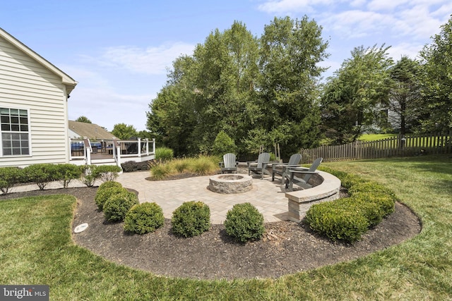 view of yard with a patio area and a fire pit