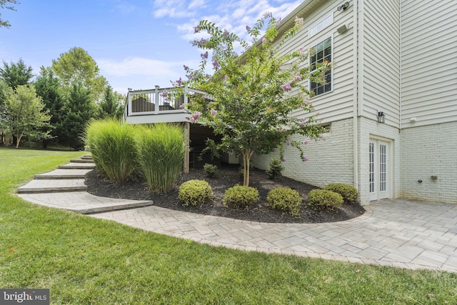 view of yard with a deck