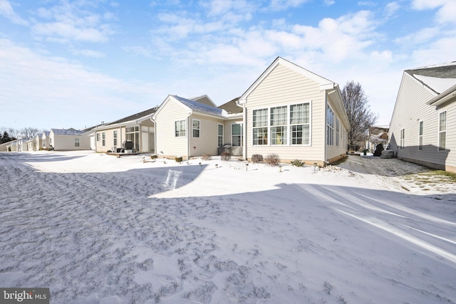 view of snow covered property