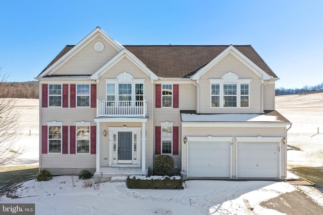 view of front of property with a garage