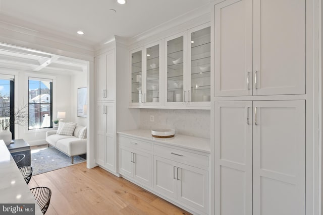 bar with beam ceiling, tasteful backsplash, recessed lighting, light wood-type flooring, and coffered ceiling