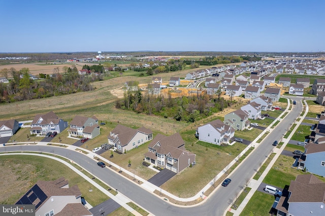 birds eye view of property with a residential view