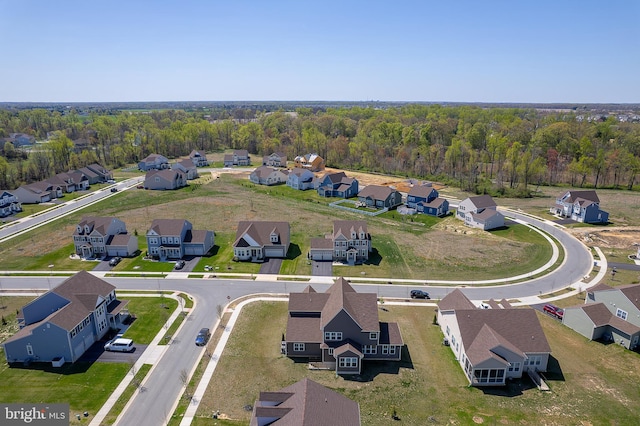 aerial view with a residential view and a forest view