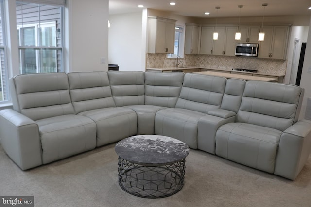 living room with light colored carpet