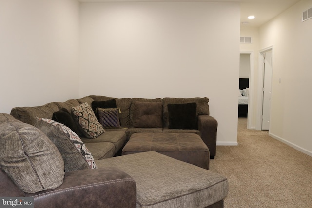 living room featuring light carpet