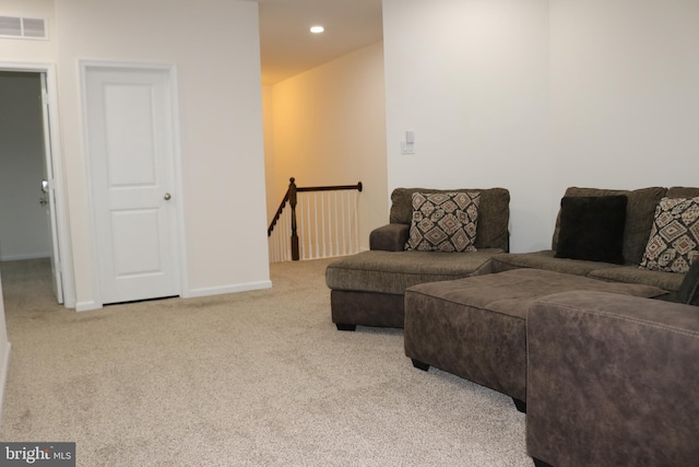 living room featuring light carpet