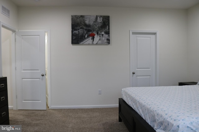 bedroom featuring carpet