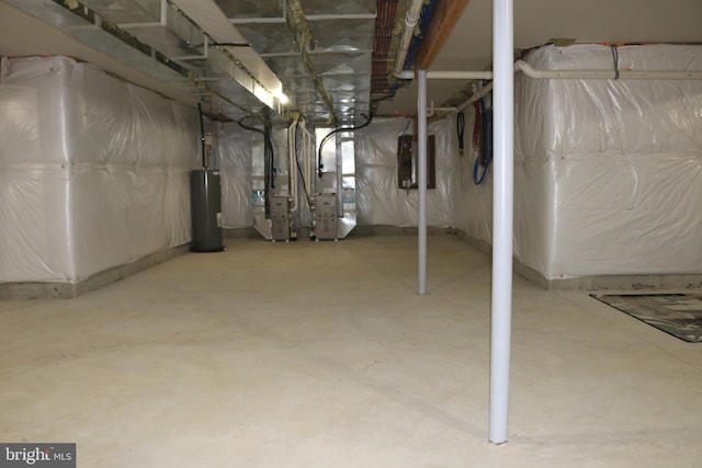 basement with heating unit and water heater