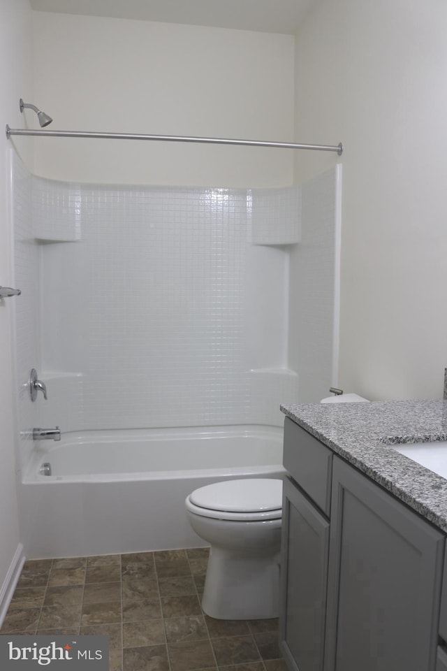 full bathroom with vanity, toilet, and bathtub / shower combination