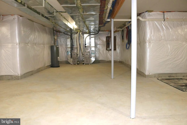 basement with heating unit and water heater