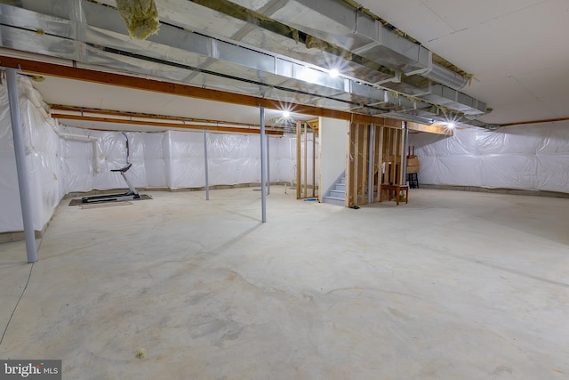 unfinished basement with stairway