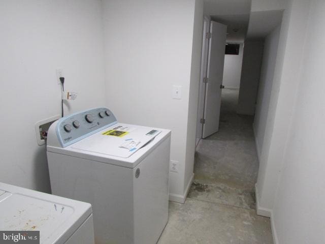 laundry area featuring washing machine and dryer