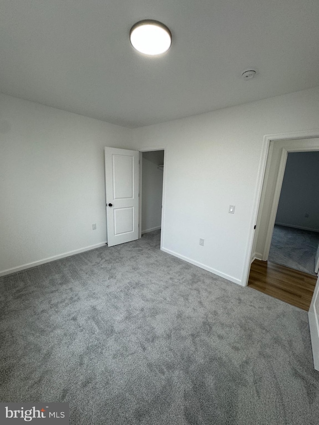 unfurnished bedroom featuring carpet floors