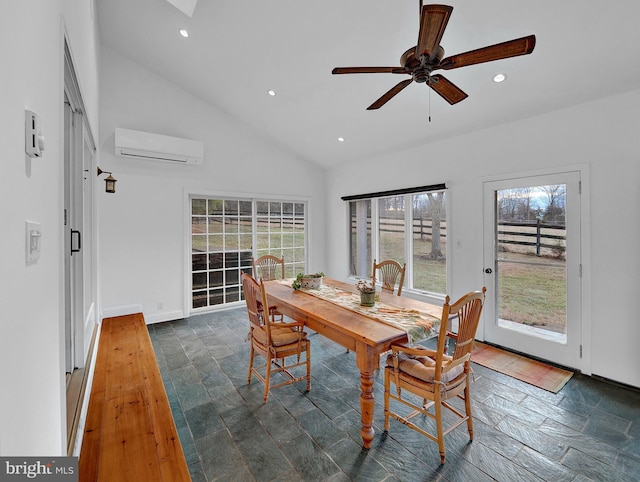 dining room featuring ceiling fan, high vaulted ceiling, a healthy amount of sunlight, and a wall mounted air conditioner