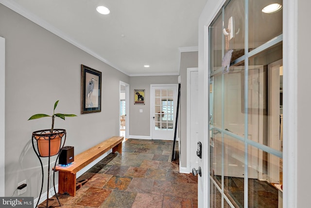 hallway with crown molding and french doors