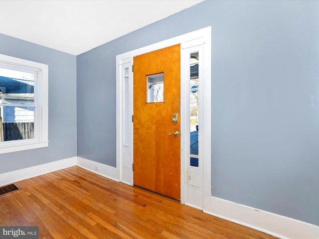 foyer with hardwood / wood-style flooring