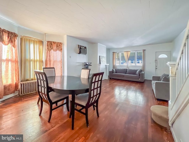 dining room with hardwood / wood-style floors