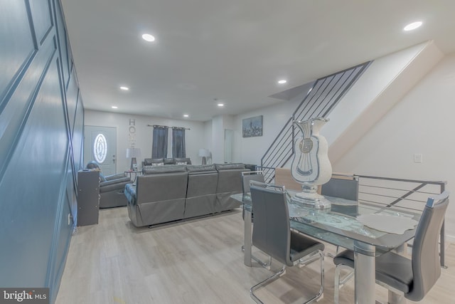 dining space featuring light hardwood / wood-style flooring