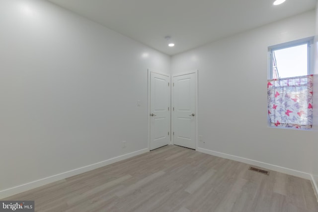 empty room featuring light wood-type flooring