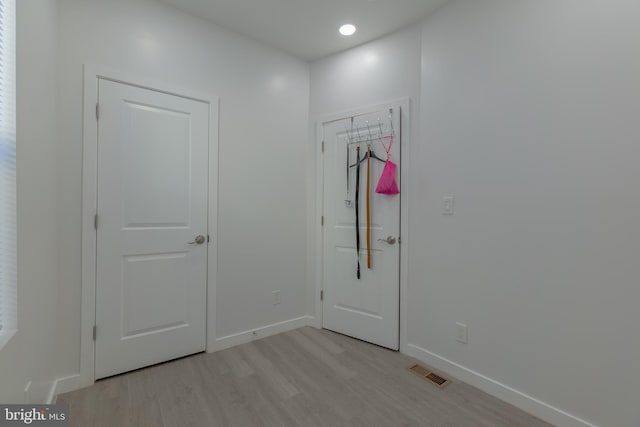 doorway to outside featuring light hardwood / wood-style floors