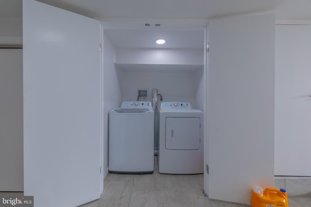 washroom featuring separate washer and dryer