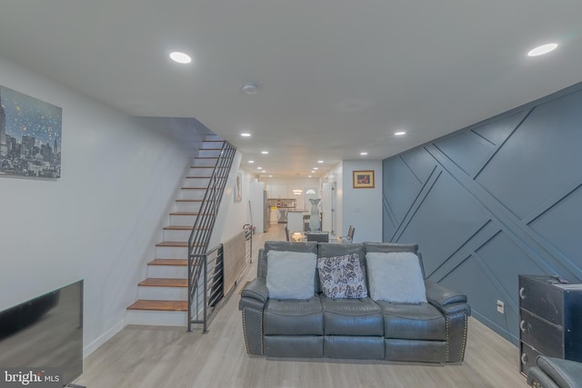 living room with light hardwood / wood-style floors