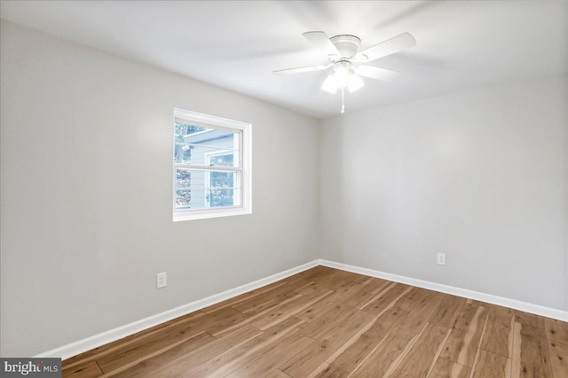 unfurnished room featuring light hardwood / wood-style flooring and ceiling fan