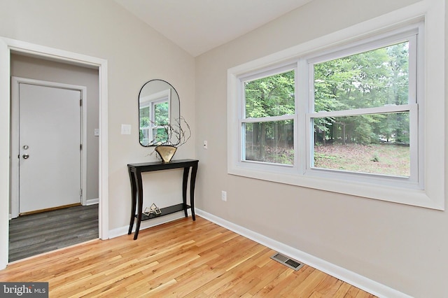 5284 Davis Ford Rd, Woodbridge, VA 22192 - entrance foyer featuring vaulted ceiling, light wood finished floors, healthy amount of natural light, and baseboards