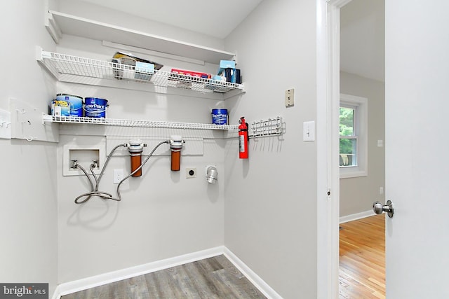 5284 Davis Ford Rd, Woodbridge, VA 22192 - walk in closet with wood finished floors