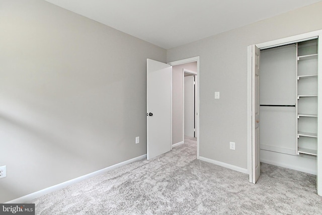 5284 Davis Ford Rd, Woodbridge, VA 22192 - unfurnished bedroom with carpet flooring, baseboards, and a closet