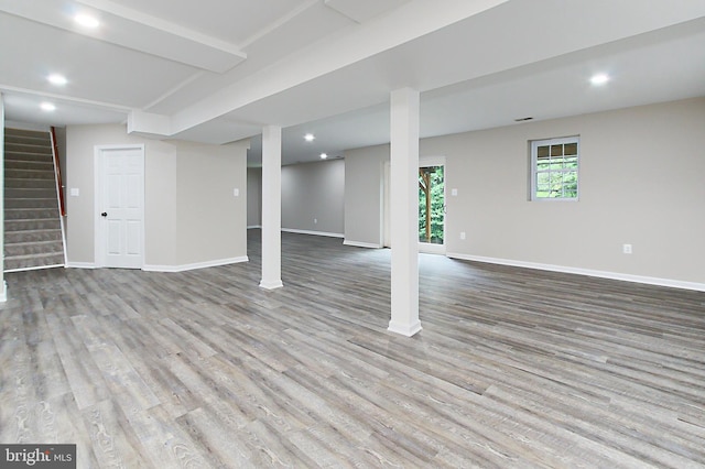 5284 Davis Ford Rd, Woodbridge, VA 22192 - basement featuring stairway, wood finished floors, baseboards, and recessed lighting