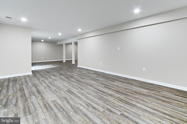 5284 Davis Ford Rd, Woodbridge, VA 22192 - finished below grade area featuring recessed lighting, wood finished floors, and baseboards
