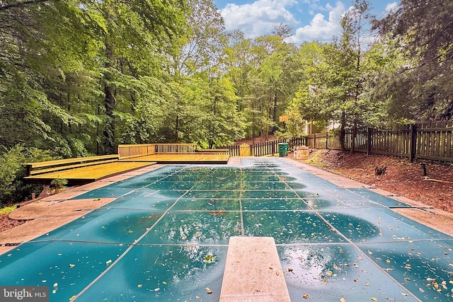5284 Davis Ford Rd, Woodbridge, VA 22192 - view of swimming pool featuring fence and a diving board