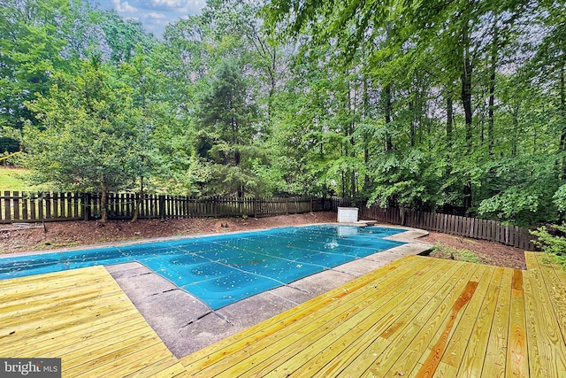 5284 Davis Ford Rd, Woodbridge, VA 22192 - view of swimming pool with a fenced backyard, a deck, and a diving board