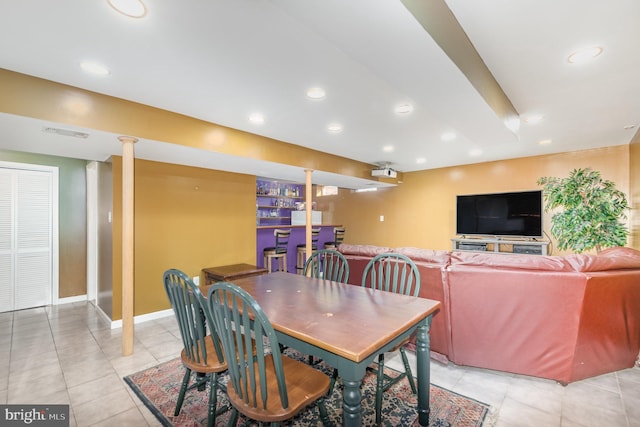 dining area featuring light tile patterned flooring