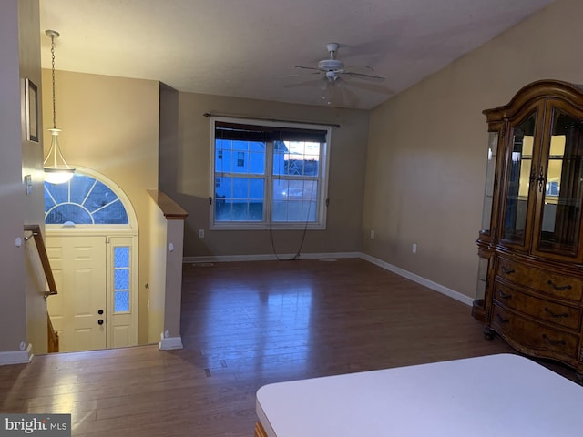 entryway featuring ceiling fan and dark hardwood / wood-style flooring