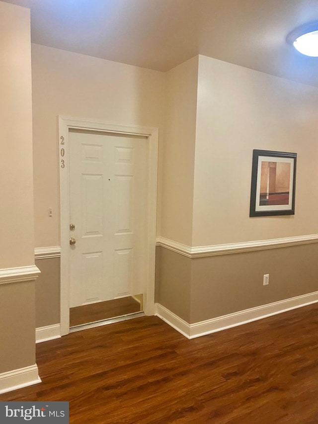 foyer featuring dark hardwood / wood-style floors