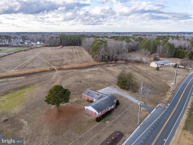 birds eye view of property featuring a rural view