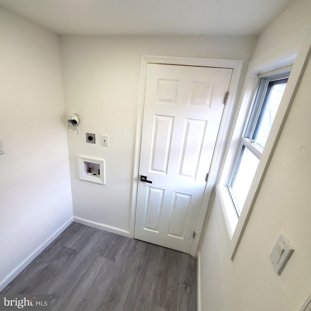 washroom with washer hookup, dark wood-type flooring, and electric dryer hookup