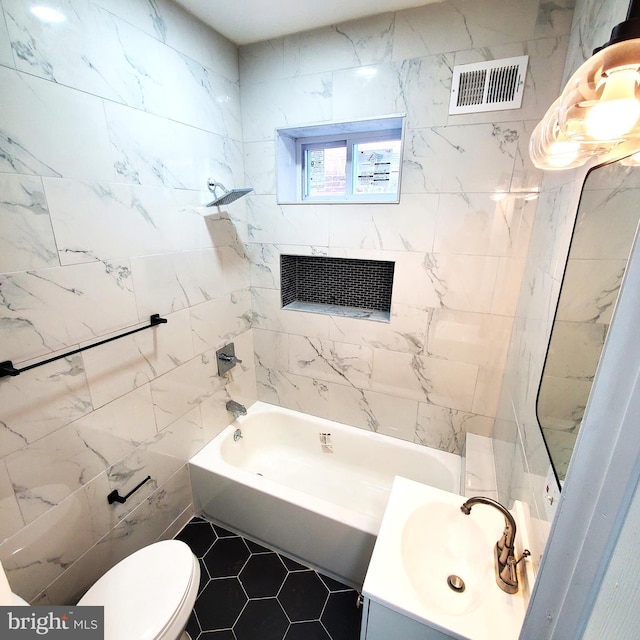 full bathroom featuring shower / tub combination, tile patterned floors, vanity, and toilet