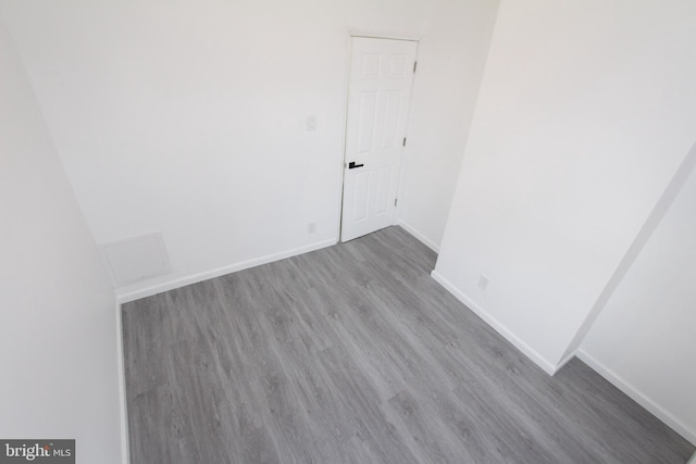 empty room featuring hardwood / wood-style floors