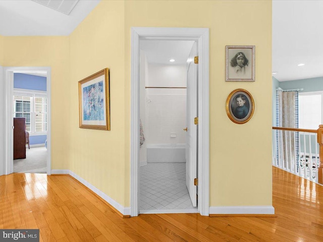 hall featuring wood-type flooring