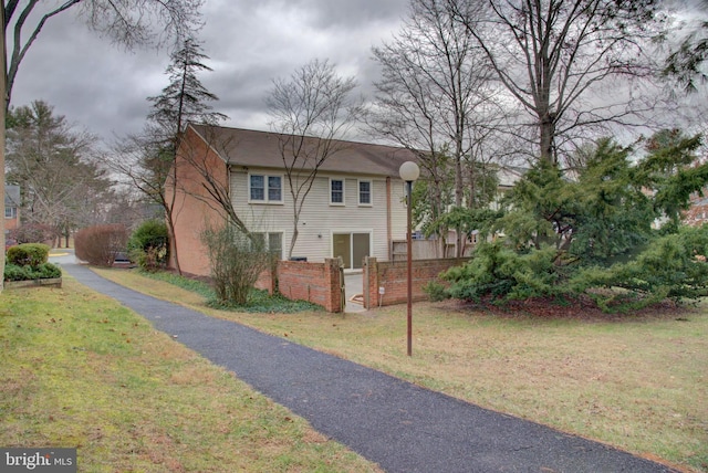 view of front of home with a front yard